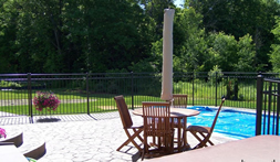 EFF-25 style aluminum fencing installed by a pool