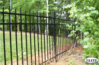 EFS-15 fencing in a yard by the woods