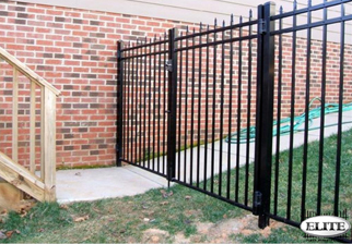 EFS-15 double aluminum gate installation attached to brick